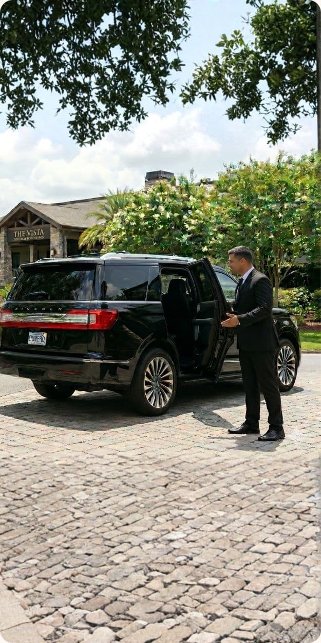 Black car SUV traveling to a Golf Championship