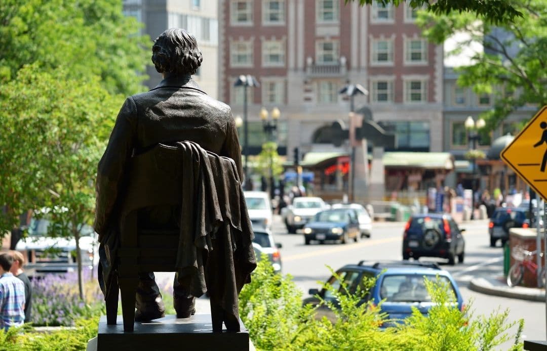 Logan Airport to Harvard Square Car Service John Harvard Statue
