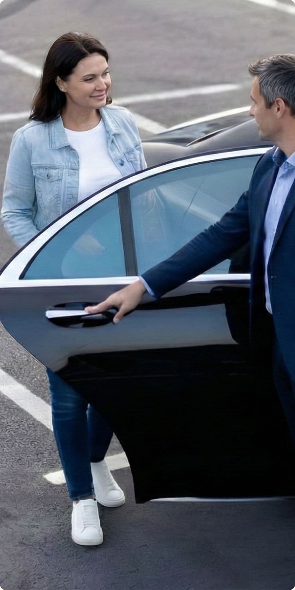 Passenger getting into luxury transfer