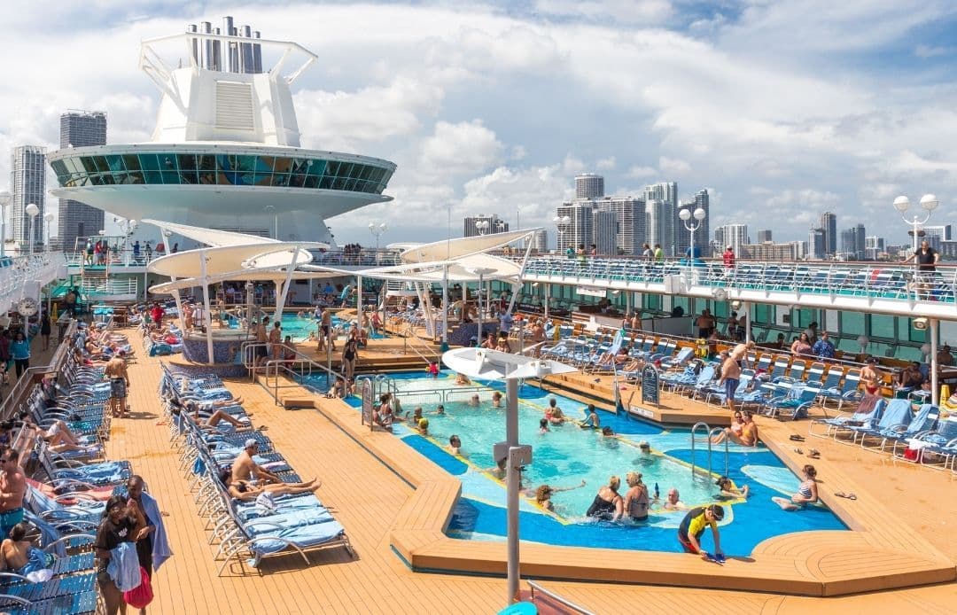 What to Do If Your Flight Is Delayed Before a Cruise Shot of Busy Cruise Deck