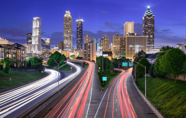 Atlanta, Georgia, USA downtown city skyline over Freedom Parkway