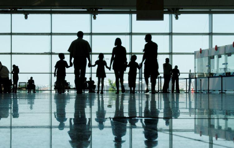 Family silhouette in the airport