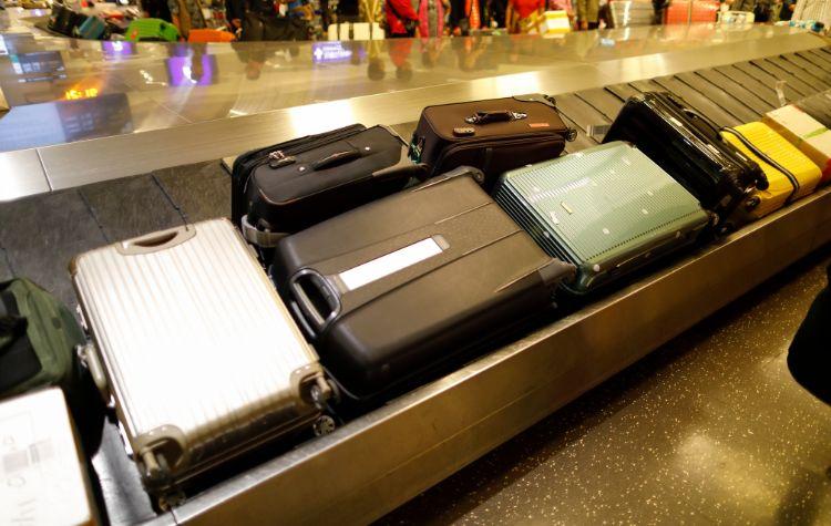Luggage sitting at baggage claim