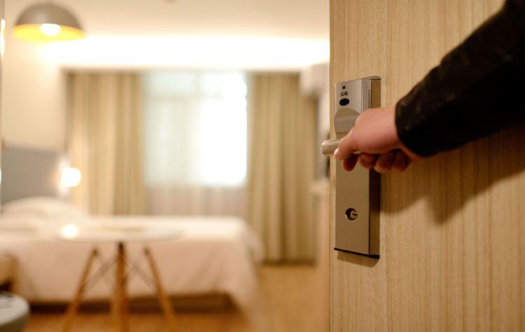 Person checking into a hotel room